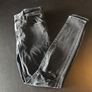 Black American Eagle “Next Level Stretch” Skinny Jeans. Distressed. Size 4